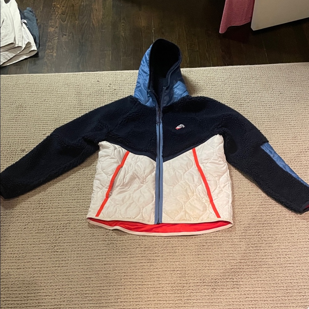 Nike Men’s Sportswear Heritage Puffer Jacket.